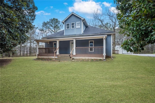 view of front of property with covered porch and a front lawn