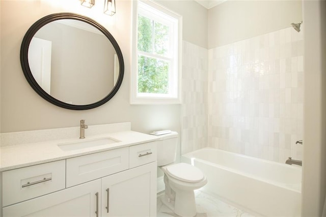 full bathroom featuring washtub / shower combination, vanity, and toilet