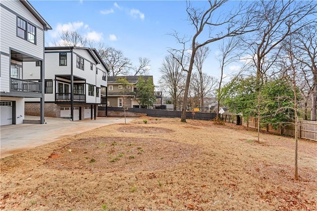 view of yard featuring a garage