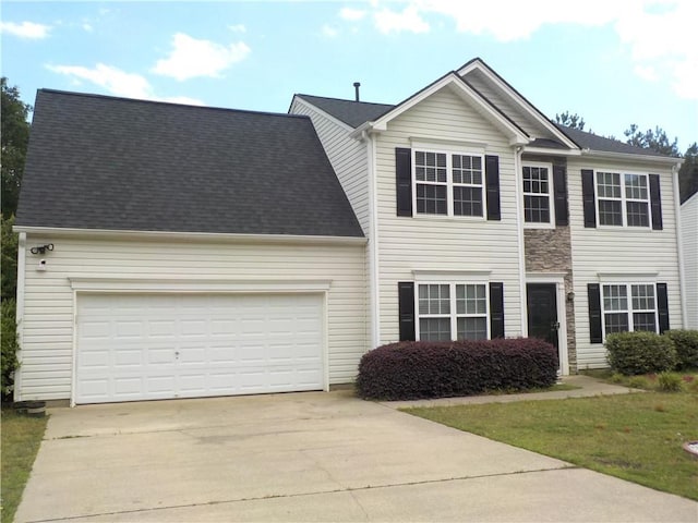 1371 Blazing Star Rd, Lawrenceville, GA 30045 - view of front facade with driveway and an attached garage