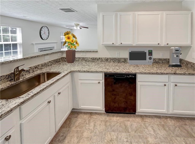 1371 Blazing Star Rd, Lawrenceville, GA 30045 - kitchen featuring dishwasher, white cabinetry, white microwave, ceiling fan, and light stone countertops
