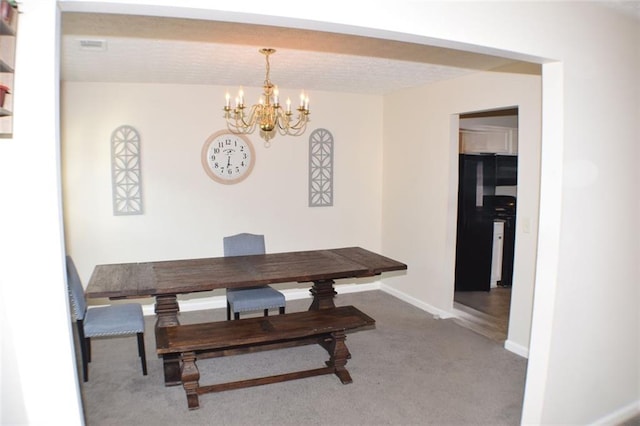 1371 Blazing Star Rd, Lawrenceville, GA 30045 - carpeted dining space featuring a chandelier and baseboards