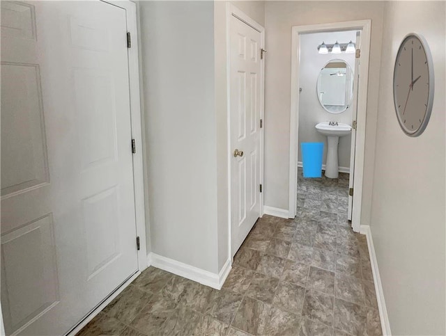 1371 Blazing Star Rd, Lawrenceville, GA 30045 - corridor with baseboards and a sink