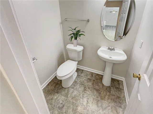 1371 Blazing Star Rd, Lawrenceville, GA 30045 - half bathroom with toilet and ceiling fan