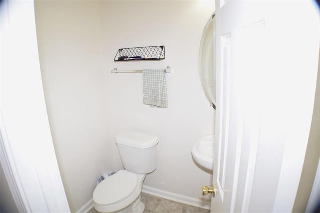 1371 Blazing Star Rd, Lawrenceville, GA 30045 - bathroom with toilet and baseboards