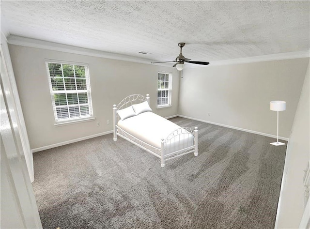 1371 Blazing Star Rd, Lawrenceville, GA 30045 - unfurnished bedroom with crown molding, carpet, multiple windows, a textured ceiling, and a ceiling fan