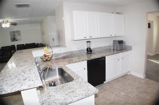 1371 Blazing Star Rd, Lawrenceville, GA 30045 - kitchen with black dishwasher, a peninsula, ceiling fan, white cabinets, and light stone countertops