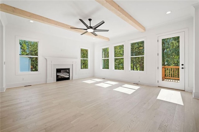 unfurnished living room with beamed ceiling, light hardwood / wood-style flooring, and ceiling fan