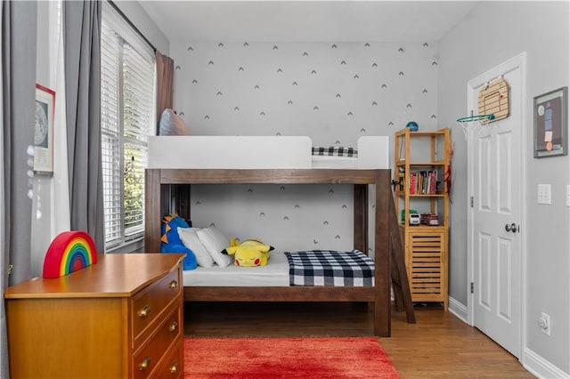 bedroom with hardwood / wood-style floors