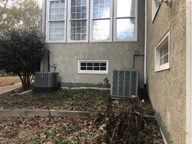 view of home's exterior featuring central AC unit