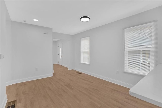 1222 E Forrest Ave, Atlanta, GA 30344 - spare room with baseboards and light wood-style flooring