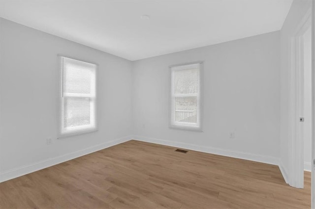1222 E Forrest Ave, Atlanta, GA 30344 - unfurnished room featuring light wood finished floors and baseboards