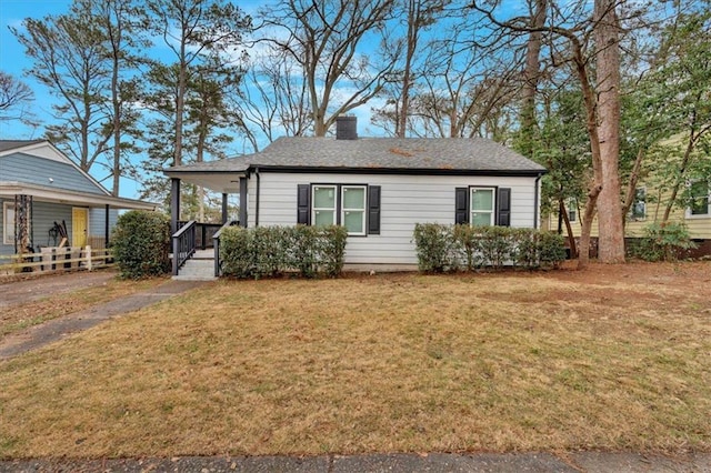 1222 E Forrest Ave, Atlanta, GA 30344 - view of front of house with a porch and a chimney