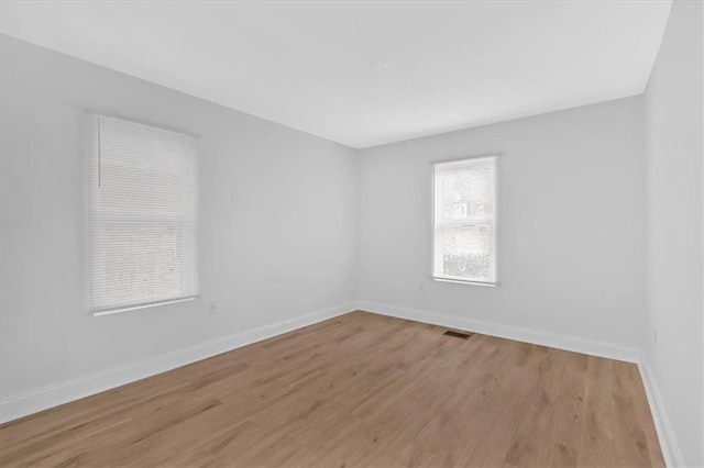 1222 E Forrest Ave, Atlanta, GA 30344 - spare room with light wood-style floors and baseboards