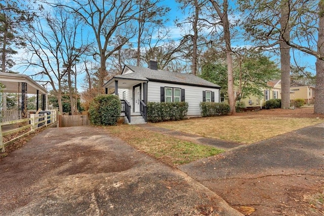 1222 E Forrest Ave, Atlanta, GA 30344 - view of front of house with a chimney