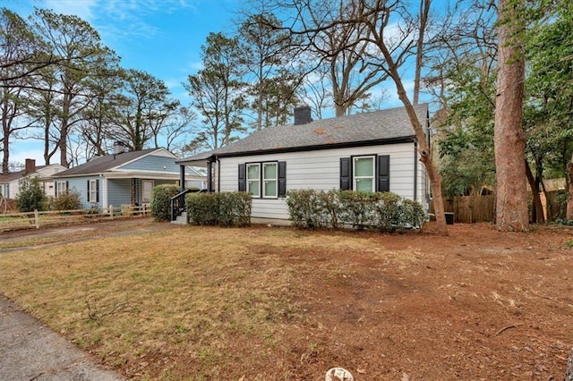 1222 E Forrest Ave, Atlanta, GA 30344 - view of front facade with a chimney