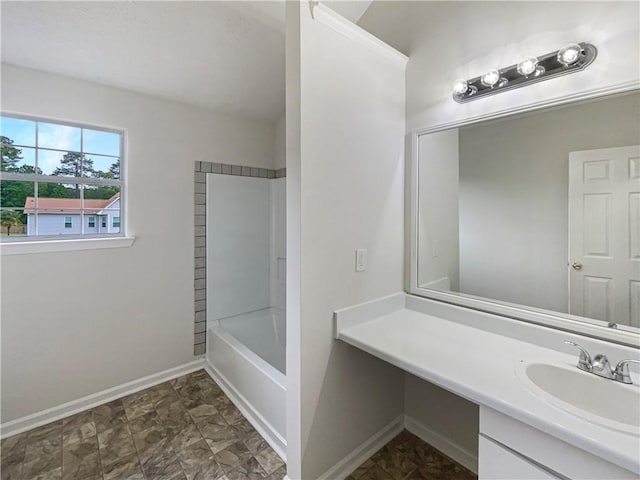 727 Overlook Crst, Monroe, GA 30655 - full bathroom with baseboards, vanity, and washtub / shower combination