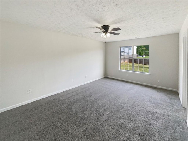 727 Overlook Crst, Monroe, GA 30655 - spare room with ceiling fan, baseboards, a textured ceiling, and dark colored carpet