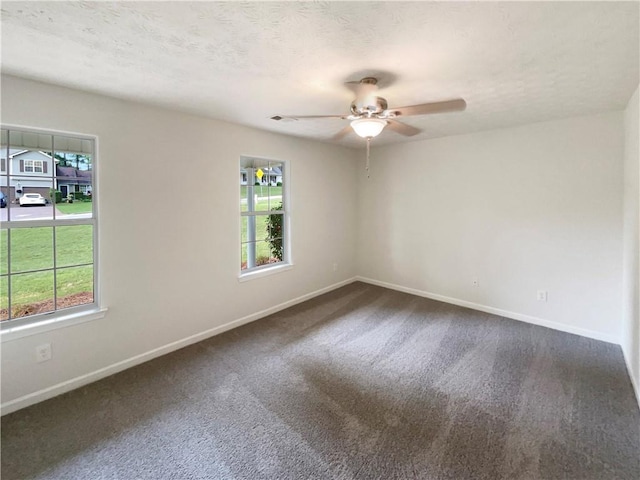 727 Overlook Crst, Monroe, GA 30655 - unfurnished room with healthy amount of natural light, ceiling fan, baseboards, and a textured ceiling