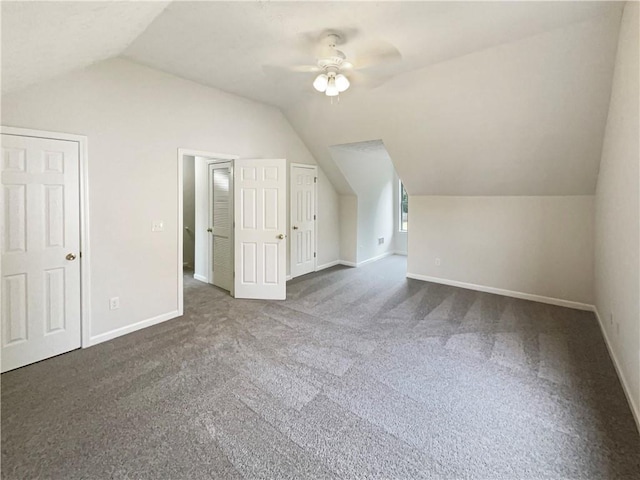 727 Overlook Crst, Monroe, GA 30655 - bonus room featuring vaulted ceiling, ceiling fan, dark carpet, and baseboards