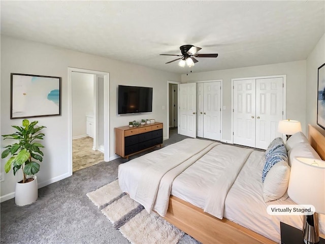 727 Overlook Crst, Monroe, GA 30655 - bedroom featuring two closets, carpet, baseboards, and a ceiling fan