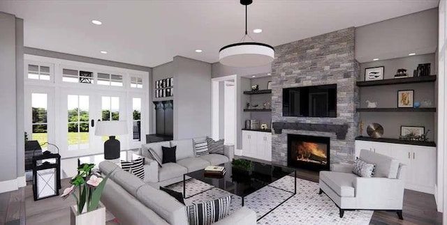 0 Wynn Dr, Carrollton, GA 30117 - living area with a stone fireplace, recessed lighting, wood finished floors, and baseboards