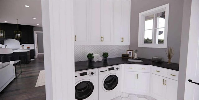 0 Wynn Dr, Carrollton, GA 30117 - laundry room featuring washer and dryer, dark wood-type flooring, cabinet space, and recessed lighting