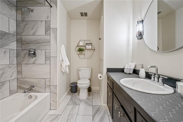 full bath with visible vents, toilet,  shower combination, baseboards, and vanity