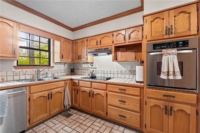 110 The Farm Rd, Mcdonough, GA 30252 - kitchen featuring crown molding, a sink, stainless steel appliances, tile countertops, and under cabinet range hood