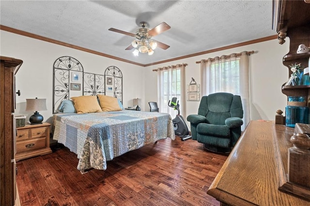 110 The Farm Rd, Mcdonough, GA 30252 - bedroom featuring crown molding, a ceiling fan, a textured ceiling, and dark wood finished floors