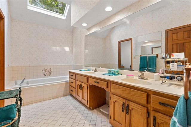 110 The Farm Rd, Mcdonough, GA 30252 - full bathroom featuring a garden tub, double vanity, wallpapered walls, a sink, and a skylight