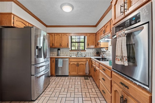 110 The Farm Rd, Mcdonough, GA 30252 - kitchen with a sink, appliances with stainless steel finishes, ornamental molding, and brick patterned floor
