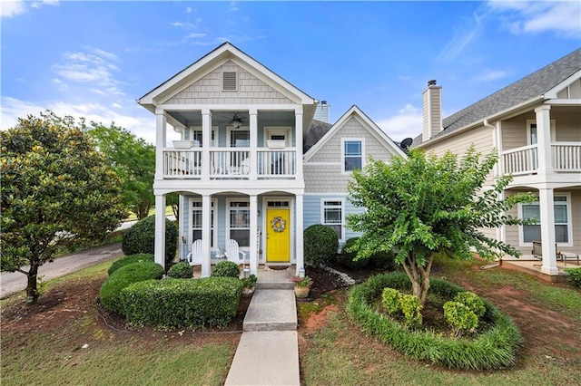 240 Daisy Cir, Mcdonough, GA 30252 - view of property featuring a balcony, covered porch, and ceiling fan
