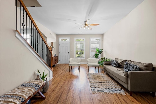 240 Daisy Cir, Mcdonough, GA 30252 - living room with a ceiling fan, stairway, and wood finished floors