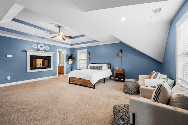 240 Daisy Cir, Mcdonough, GA 30252 - carpeted bedroom with multiple windows, a raised ceiling, and ceiling fan