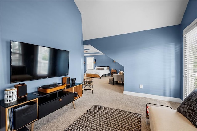 240 Daisy Cir, Mcdonough, GA 30252 - carpeted living room with vaulted ceiling and baseboards