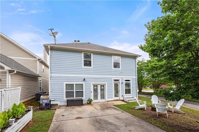 240 Daisy Cir, Mcdonough, GA 30252 - rear view of property with french doors and a patio