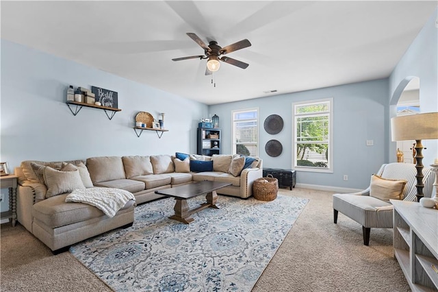 240 Daisy Cir, Mcdonough, GA 30252 - carpeted living room with a ceiling fan and baseboards
