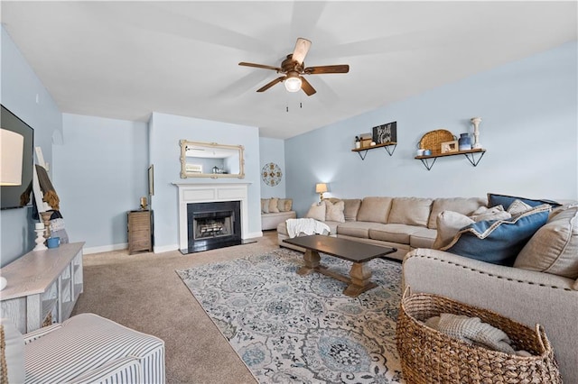 240 Daisy Cir, Mcdonough, GA 30252 - carpeted living area with a ceiling fan and a fireplace with flush hearth