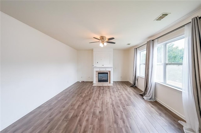 5280 Lakerock Way S, Fulton, GA 30331 - unfurnished living room featuring a ceiling fan, wood finished floors, and a fireplace