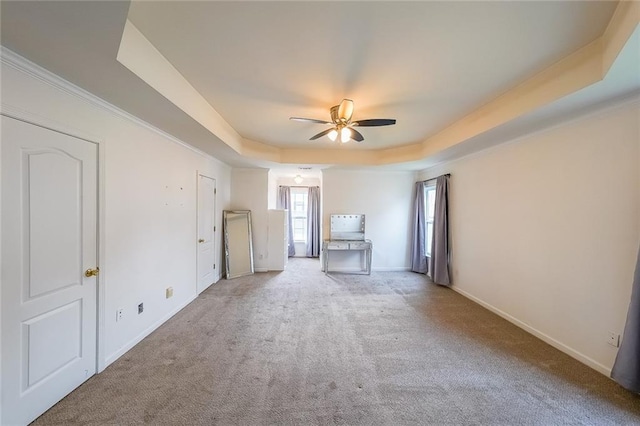 5280 Lakerock Way S, Fulton, GA 30331 - unfurnished living room with a raised ceiling, carpet floors, and a ceiling fan