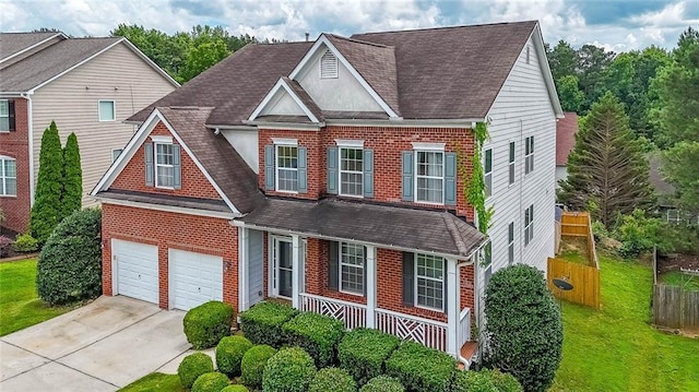 5280 Lakerock Way S, Fulton, GA 30331 - view of front facade with brick siding, roof with shingles, covered porch, and driveway