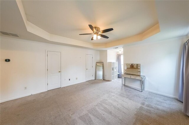 5280 Lakerock Way S, Fulton, GA 30331 - unfurnished living room with a raised ceiling, ceiling fan, and carpet floors