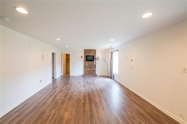 5280 Lakerock Way S, Fulton, GA 30331 - unfurnished living room with wood finished floors and recessed lighting