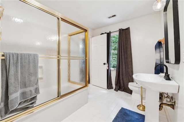 34 Johnston Row NW, Cartersville, GA 30121 - bathroom with enclosed tub / shower combo and tile patterned floors
