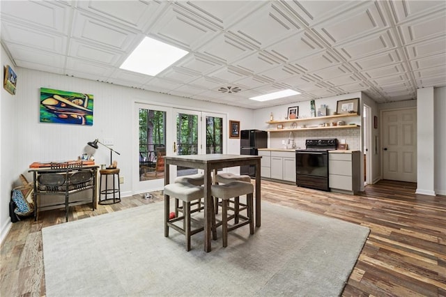 34 Johnston Row NW, Cartersville, GA 30121 - dining space with wood finished floors, an ornate ceiling, french doors, and a dry bar