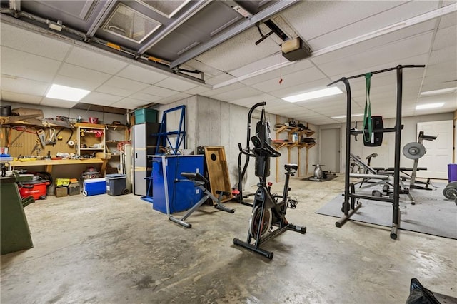 34 Johnston Row NW, Cartersville, GA 30121 - garage with a workshop area and a garage door opener