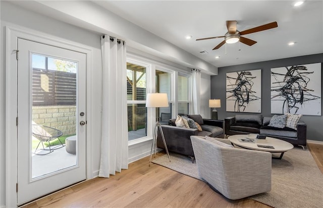 1105 Rivard Cir NW, Atlanta, GA 30318 - living area featuring light wood-type flooring, a ceiling fan, recessed lighting, and baseboards