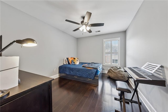 bedroom featuring baseboards, visible vents, ceiling fan, and dark wood-style flooring