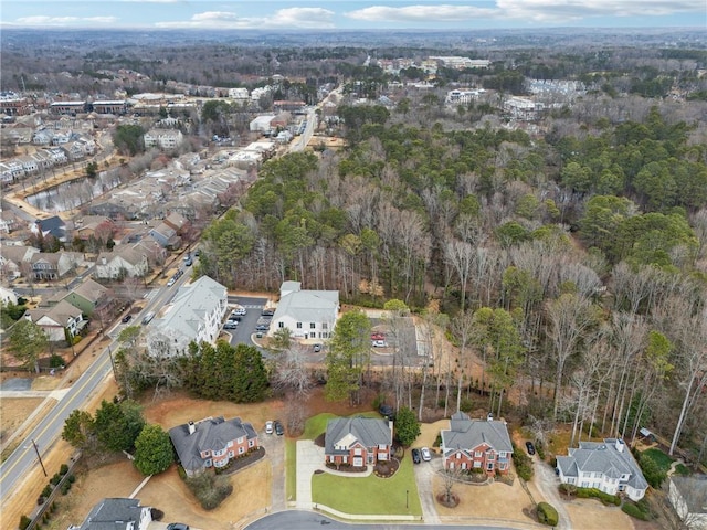 birds eye view of property with a residential view